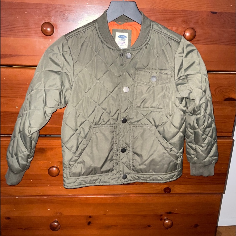 Boys army green O.N. light puff jacket w/5 snap buttons. Orange lining. Pockets.